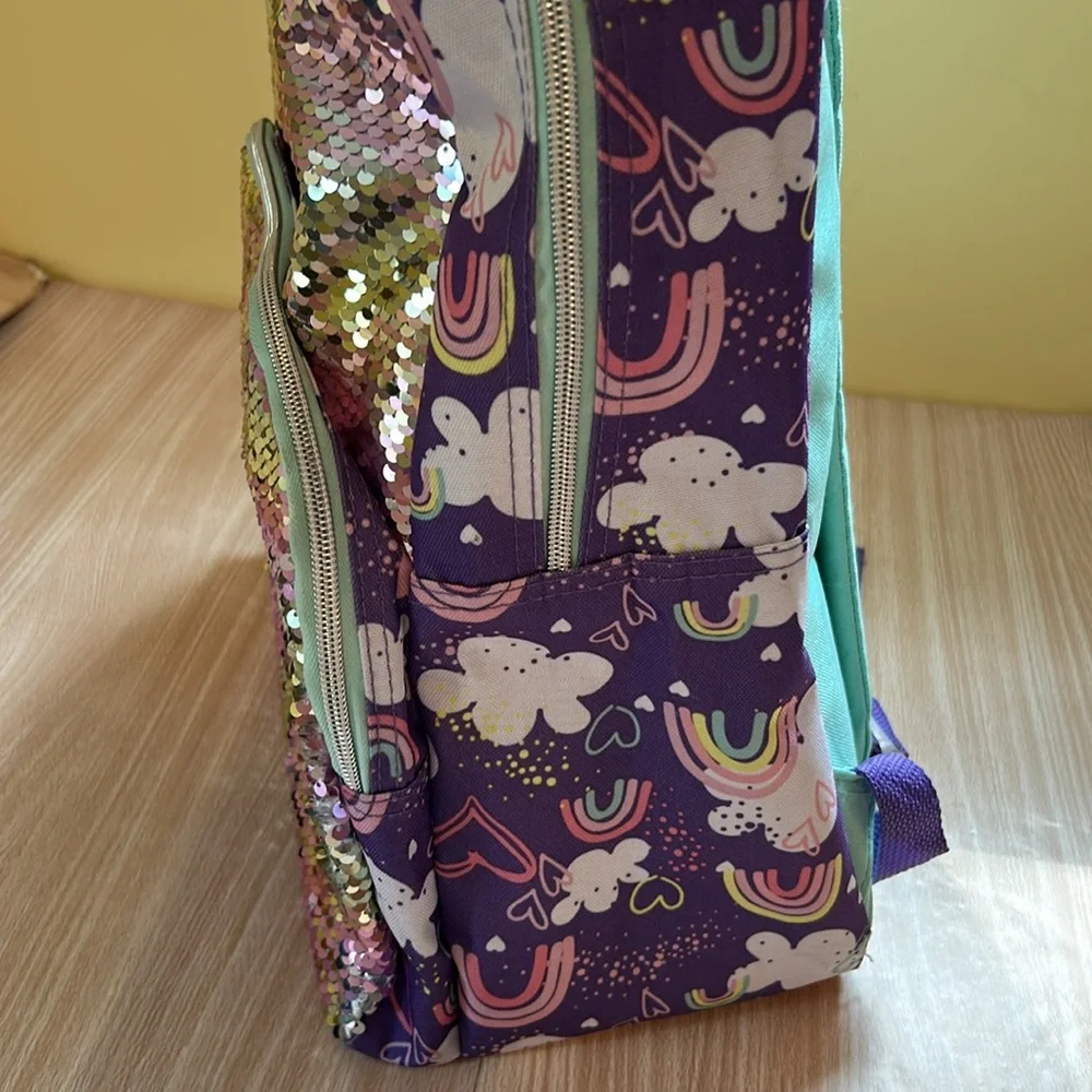 Purple rainbows and sparkles backpack